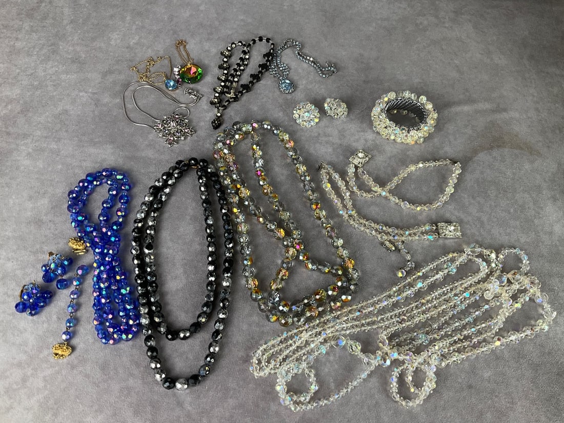 Vintage & Fashion Crystal Jewelry: Aurora borealis faceted beads, blue, black, smoky. Blue beads have been restrung but were a Hattie Carnegie necklace, matching clip earrings included. Some newer necklaces. Overall good condition exce