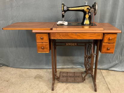 Singer Sewing Machine: Has been cleaned and is in very good condition for age. Serial number AC970953 dates it to August 2, 1929. Dimensions when closed are 34 inches wide x 16.5 inches x 30 inches.