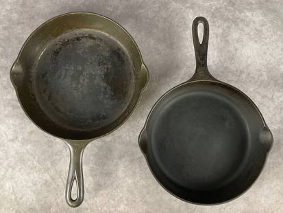 Two Griswold Cast Iron Skillets: One no. 6 and one no. 7 skillets, both marked Griswold. 8 and 7.5 inch bases. Show signs of general use, smaller has some surface rust to underside.