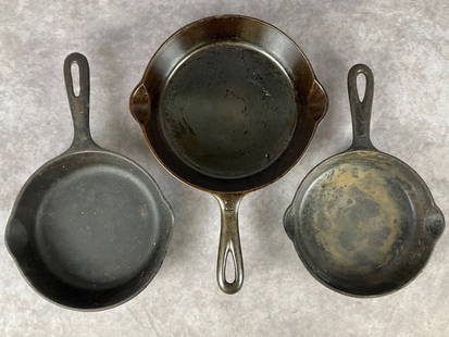Three Griswold Cast Iron Skillets: 8, 7, and 6 inch skillets all marked for Griswold. Show signs of age and use but overall good condition.