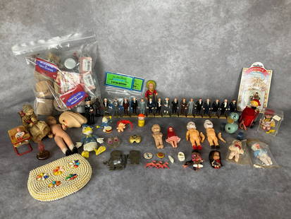 Miniatures, Toys, and More: Includes set of sixteen 3 inch plastic standing American President figures, celluloid and plastic dolls, wooden toys, seed bead childs purse, dollhouse miniatures, and more. Fair to good condition.
