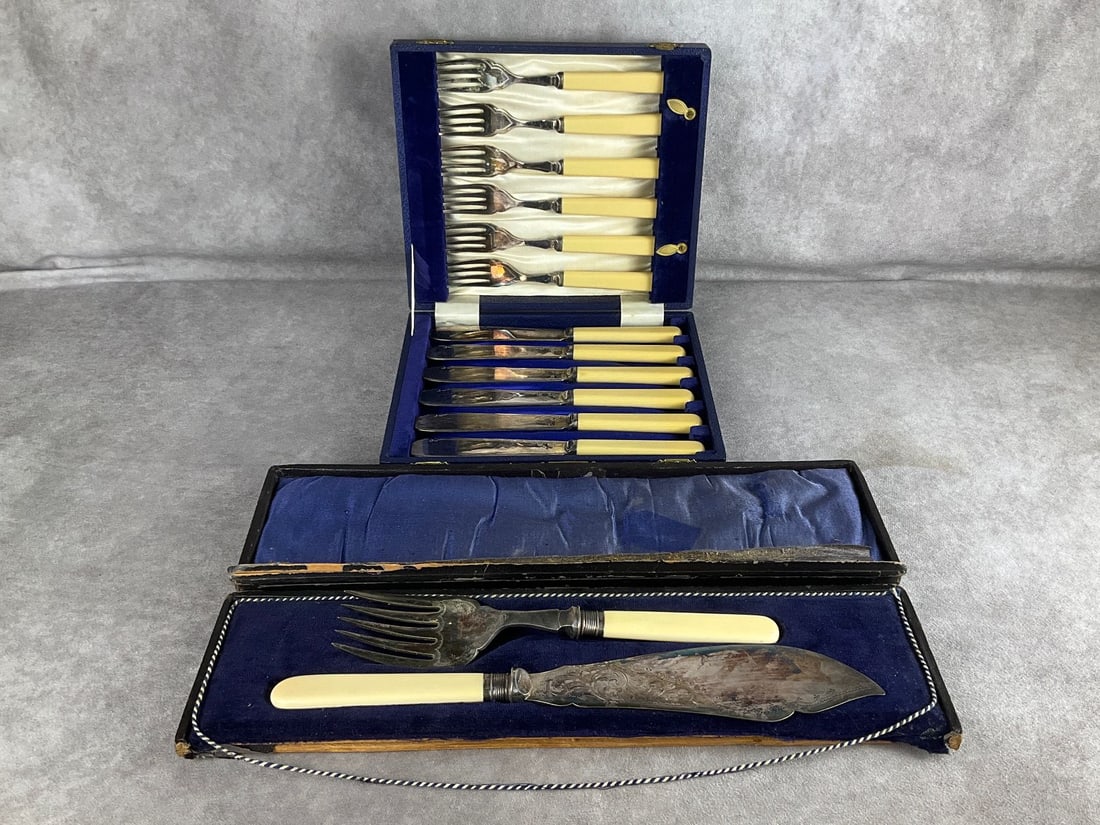Antique Silverplate Fish Set: Late 19th century fish serving fork and knife set. Tines and blade are Sheffield plate, band over bone handles appear to be Sterling silver with Sheffield, England hallmarks and makers mark of C.B., p