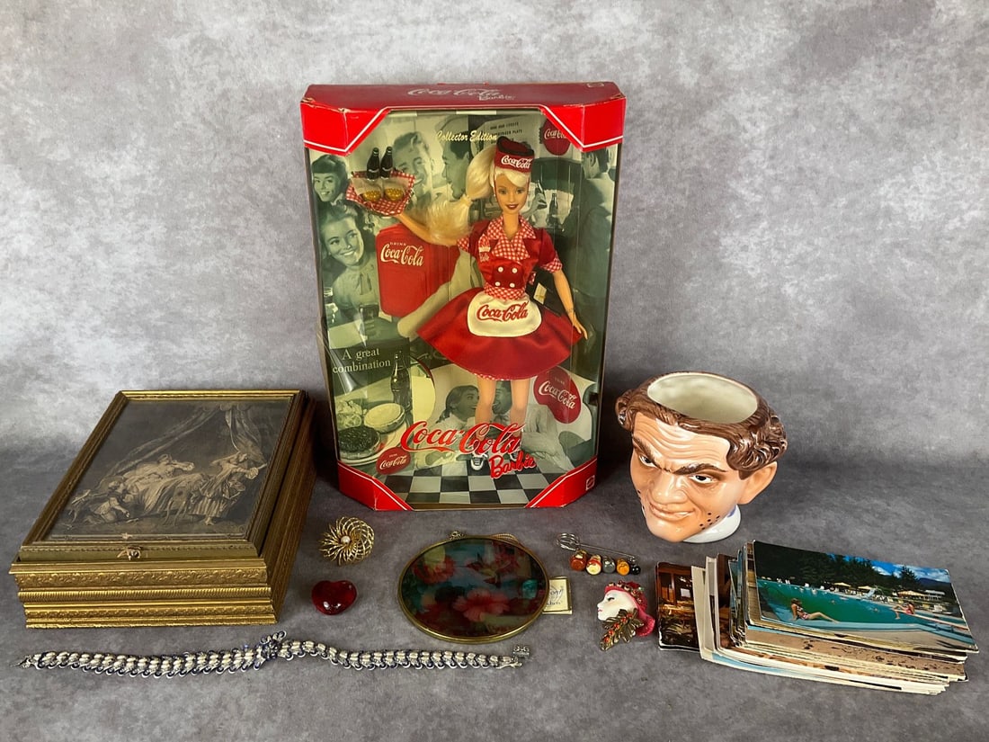 Coca Cola Barbie: Boxed Collector Edition Barbie from 1998 that has discoloration to box plastic as well as crack along one side. Also, Disney character mug, older dresser box with mirrored interior lid and glass linin