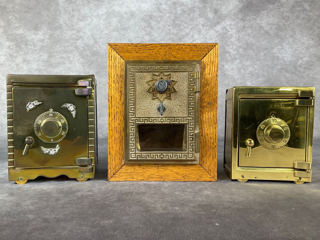 Post Office Box Bank: Bank is locked, attached with screws in the back. 5.5 inches wide x 3 x 6.75 inches tall. Along with two newer brass safe banks. Both unlocked and combinations included. Good condition.