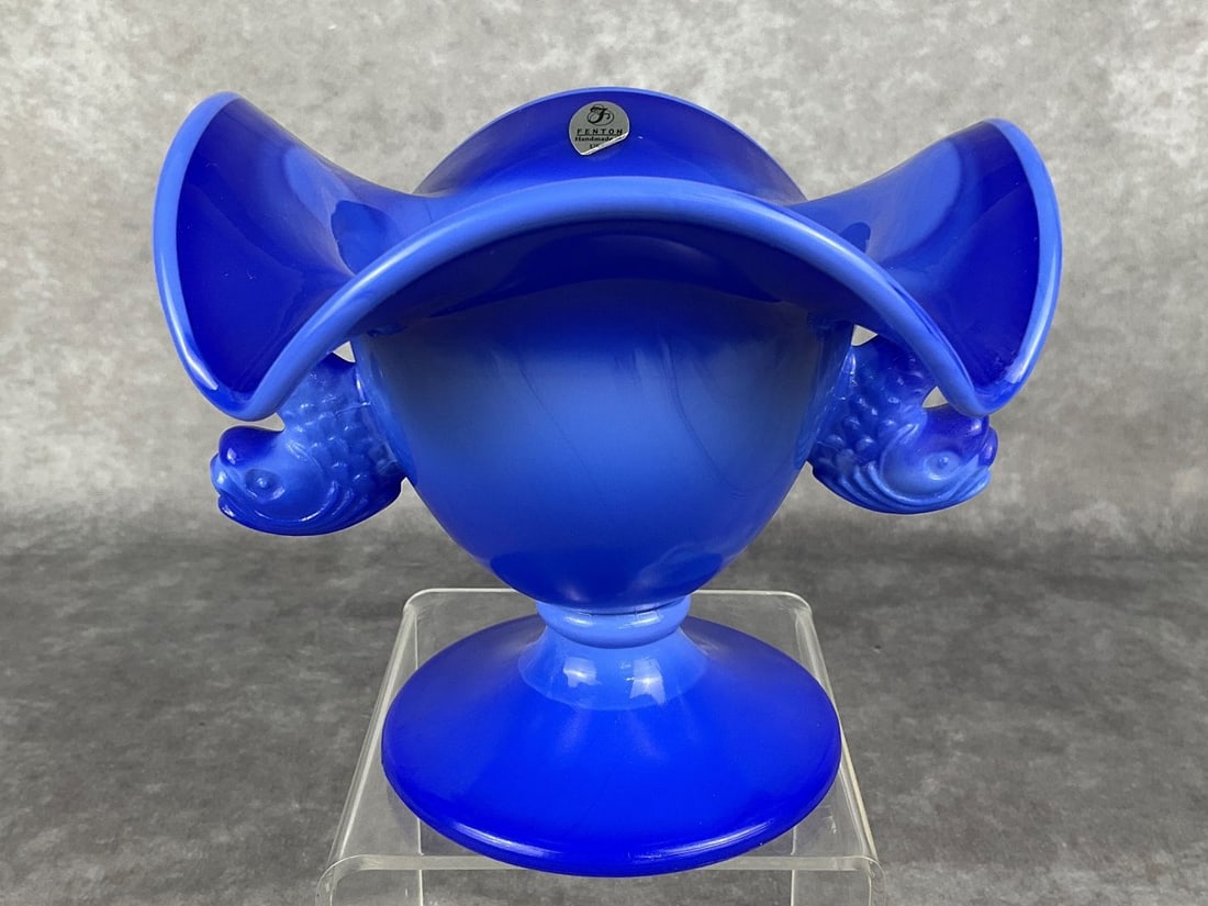 Fenton Dolphin Comport: In Periwinkle slag glass blue. Signed and with original stickers. 4.75 inches tall. Good condition.