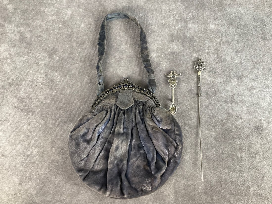 Rhinestones & Velvet Handbag: Blue and clear stones on metal frame. Blue velvet is faded and stained. Silk interior is shredded. With modern made sterling and marcasite hatpin, and vintage love birds spoon brooch. Jewelry in good 