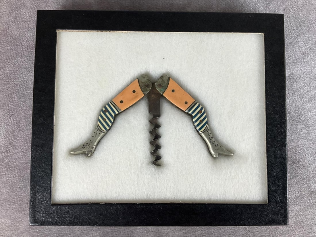 Antique Ladies Legs Corkscrew: Corkscrew in the shape of ladies legs in blue and white striped stockings and Victorian boots. Marked Comfort S.R.D. Likely German in origin. Some rust and verdigris to metal. Celluloid on one side of