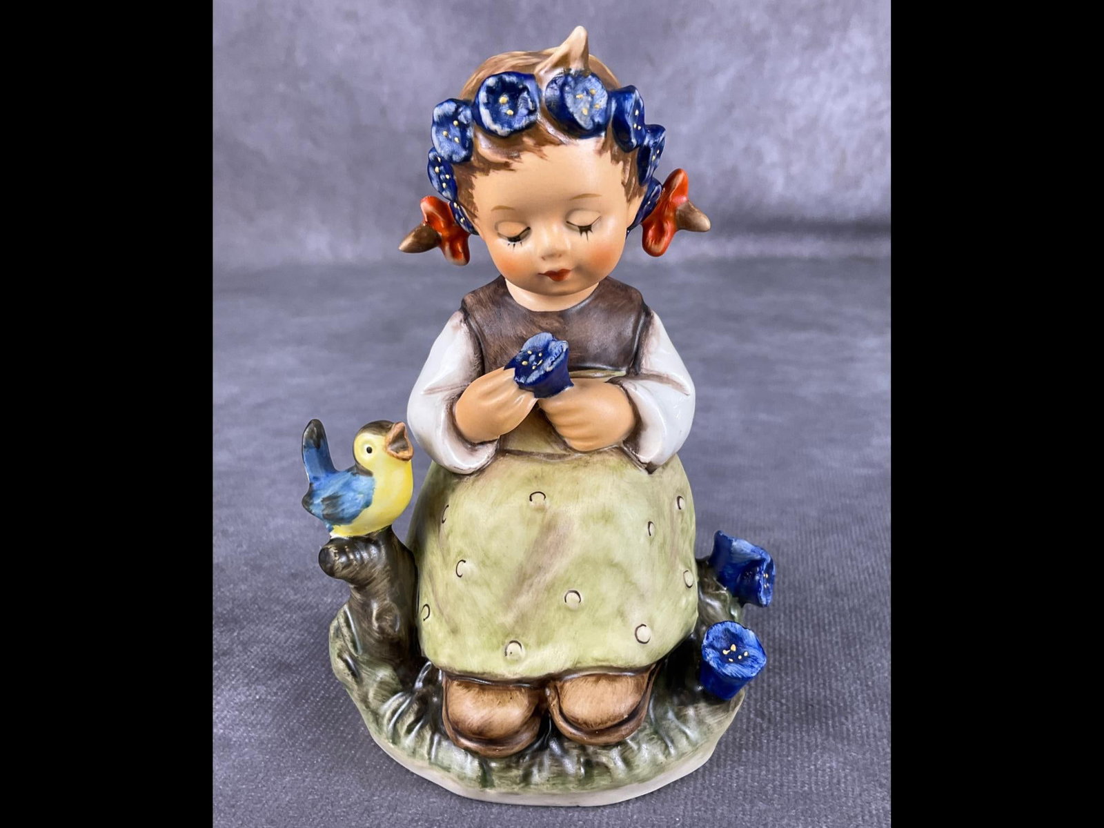 Hummel The Botanist Figurine: Good condition. Marked 351 and 1972. She is 4.5 inches tall.