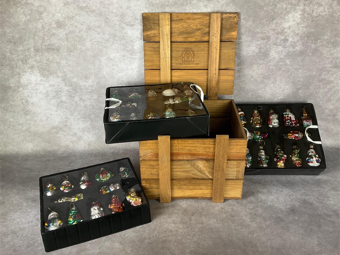 Pacconi Christmas Ornament Collection: Thomas Pacconi Classics wooden crate box with three trays of blown glass ornaments from their 2002 Collection. Includes 36 ornaments total, with C.O.A. Good condition. Box dimensions 13 x 12 x 10 inch