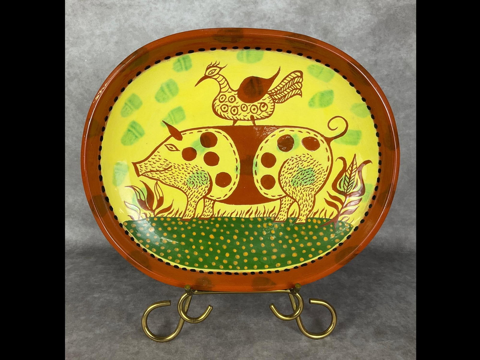 James Christian Seagreaves Serving Platter: Redware pottery by Pennsylvania potter James Christian Seagreaves. Small handle on each side. Central image of a hog with a bird on his back. Marked JCS 1986. Good condition. 12.25 inches wide x 10 x