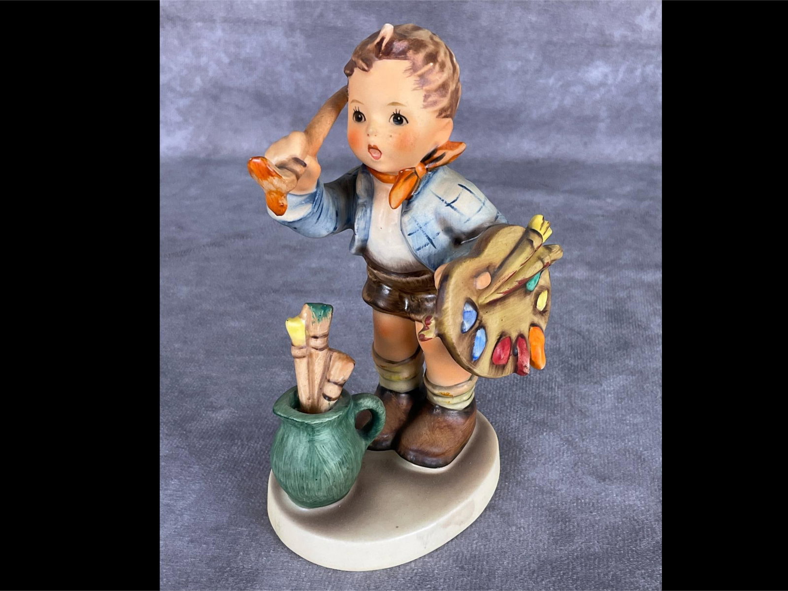 Hummel Figurine The Artist: With paper name label on the side. Marked 304 and 1955. Good condition. 5.25 inches tall.