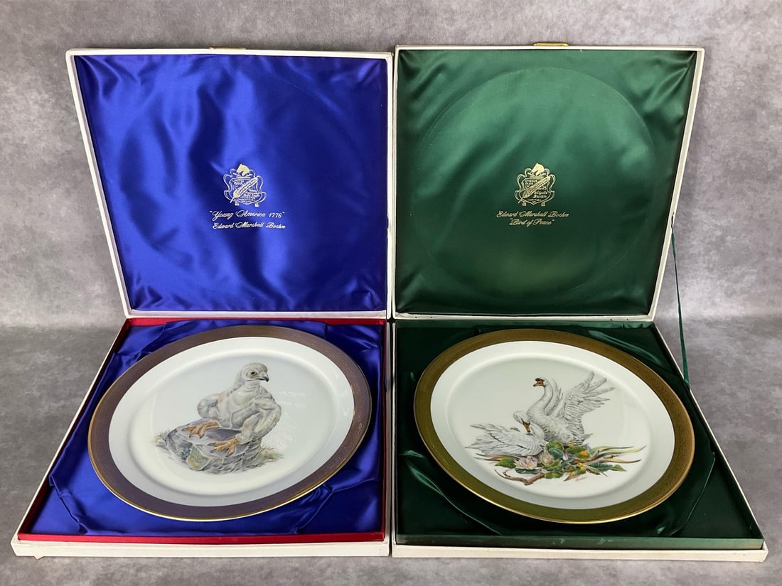 Boehm Collector Plates: Two limited edition 13 inch porcelain plates by Edward Marshall Boehm, in original boxes with certificates. Includes Bird of Peace with mute swans from 1972, and Young America 1776 with eaglet from 19
