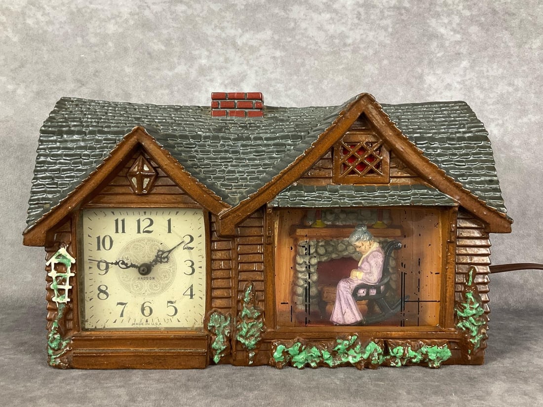 Home Sweet Home Clock: 1960s electric mantel clock by Haddon Products, Inc. model #30, titled Home Sweet Home. Powers on. Paint loss to glass front,otherwise good condition. 12 x 3.5 x 7.5 inches.