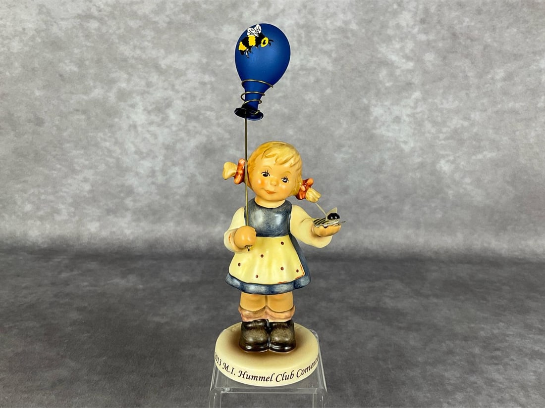 A Bee For You: 2013 M.I. Hummel Club Convention HUM 2294. TMK 9. With National Breast Cancer Foundation backstamp, and artist signature on bottom. 5.75 inches tall. Good condition. Includes original box.