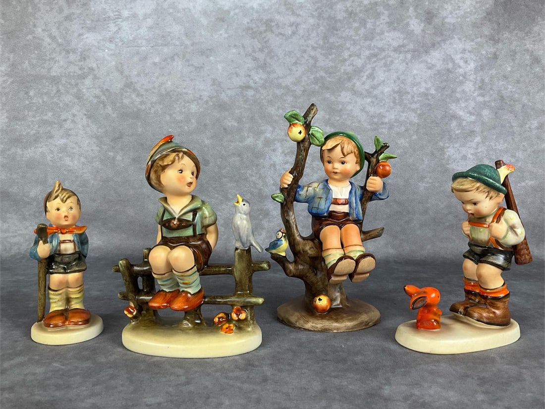 Four TMK 2 Boy Figurines (1 of 10)