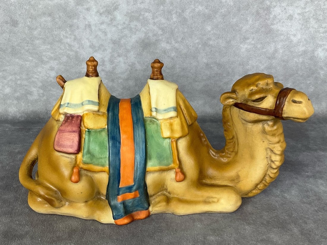 Goebel Lying Camel: 46 821-11. TMK 6. Height of 4.5 inches. Good condition.