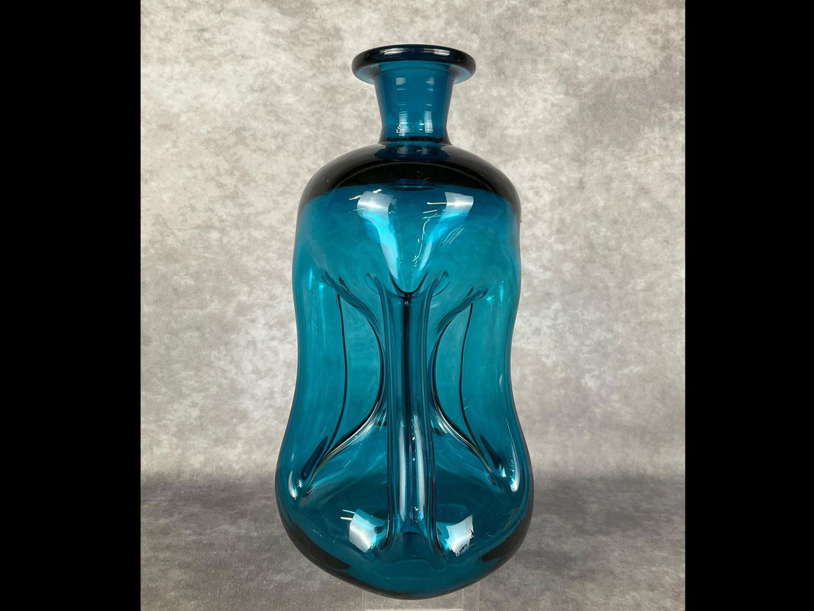 Holmegaard Blue Kluk Kluk Decanter: Missing stopper. A few fleabites at the pontil point. 8.5 inches tall.