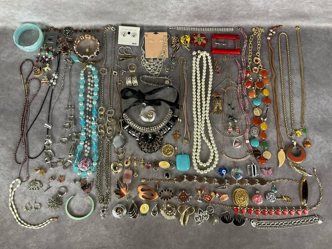 Fashion & Costume Jewelry: Necklaces, bracelets, pendants, brooches, post earrings, rings and more. Few signed pieces including Laurel Burch, Roman, J. Crew, Cultre, Coro, and Sarah Cov. Several with light tarnish and wear but