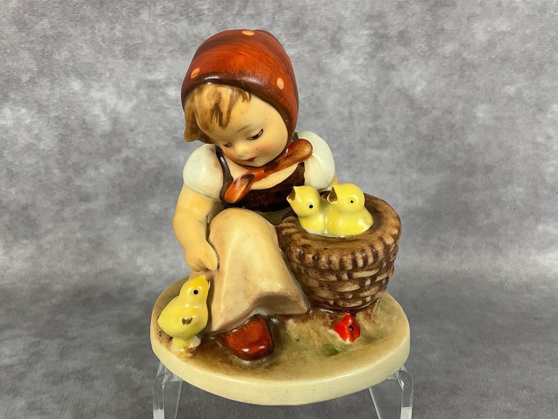 Chick Girl - U.S. Zone Germany: Hum 57/0. TMK 1 incised crown with stamped U.S. - Zone Germany. 3.5 inches tall. Moderate crazing but overall good condition.