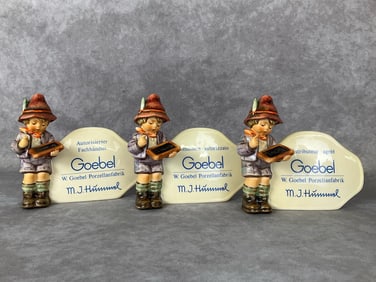 Three TMK 6 Authorized Retailer Plaques