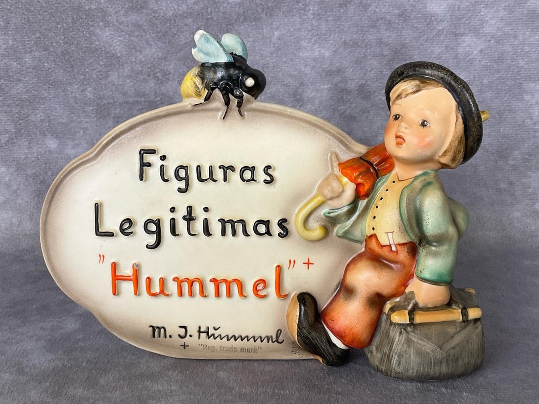 Spanish Dealer's Plaque TMK 2: Hum 213 Merry Wanderer M.I. Hummel dealer rare Spanish plaque with stamped full bee. Sticker on back designates this as being an Authentic Figurine from the Private Collection of Ruth A. and Robert L.