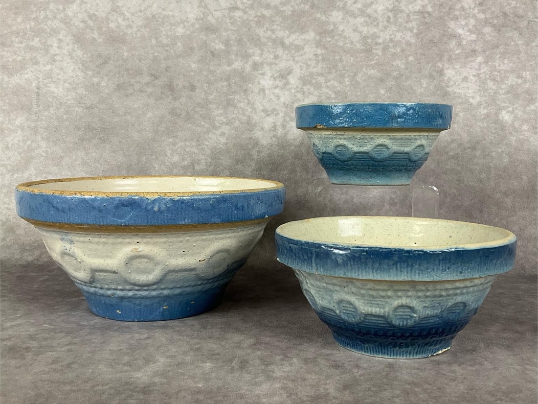 Wedding Ring Salt Glaze Bowls: Group of three in blue and white. Largest is 8 inches wide x 4 inches tall. There is an original flaw on the bottom that is covered with glaze. Some crazing with discoloration to the interior. Second