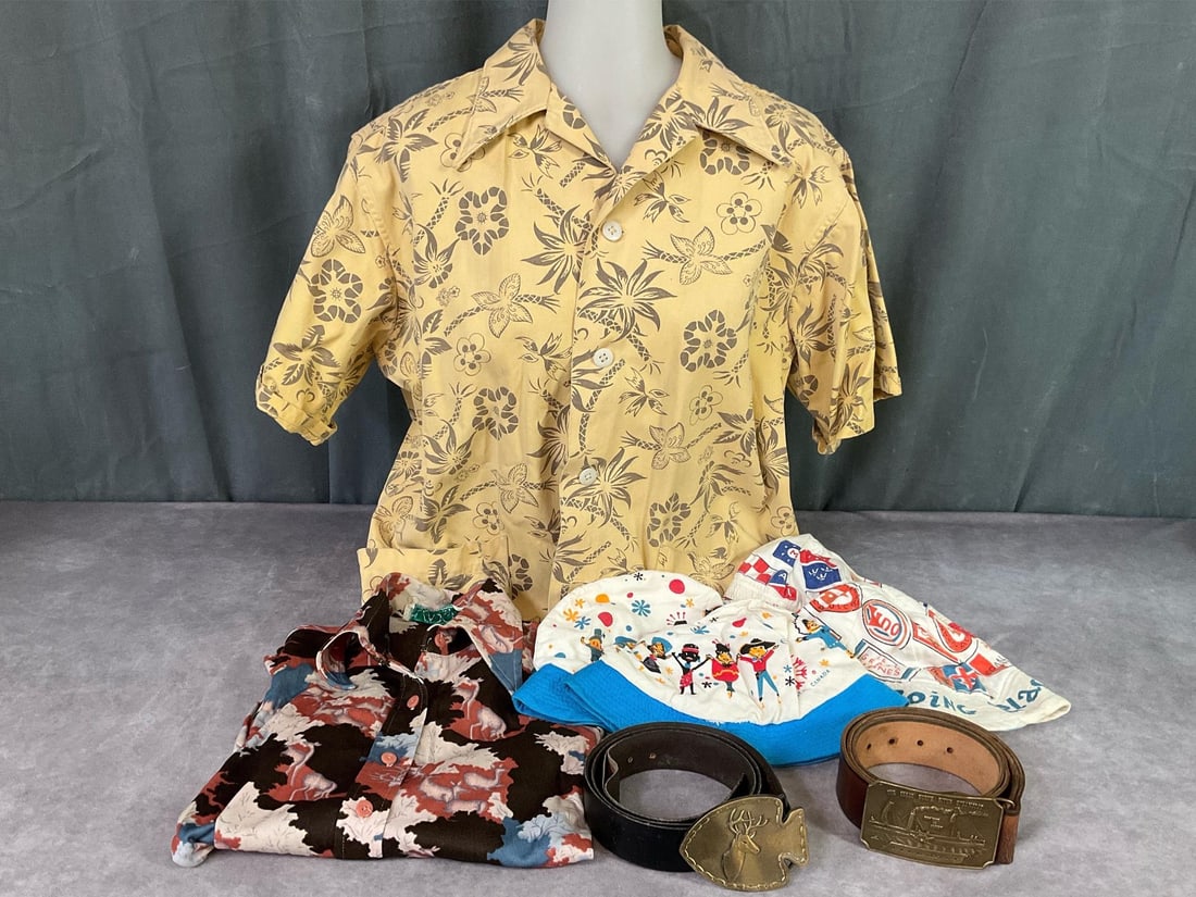 Vintage Hawaiian Shirt & More: Canvas Hawaiian shirt, yellow with flowers, no tags, two front pockets, some fading. 1970s deer print polyester shirt, small shirt. Four 1967 Canadian Expo canvas hats, creasing and some staining. Two
