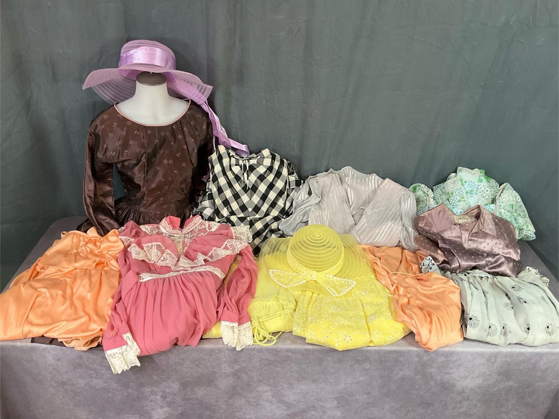 1960s & 70s Dresses: Ten dresses, one skirt, and two hats. Some have labels such as Jonathan Logan, Fred Perlberg, and Viveinne. Appear to be modern small to extra small in size. Fair to good condition, not every dress wa