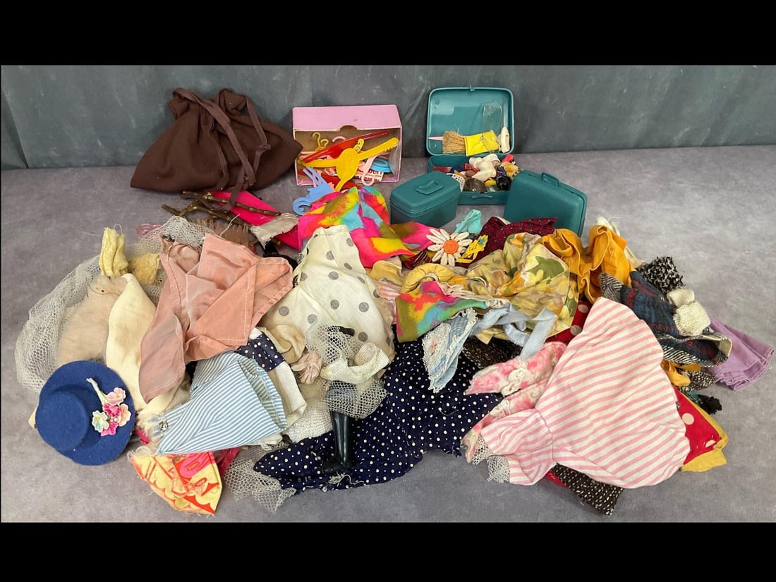 Large Lot of Barbie Clothes and Accessories: Over 75 items of clothing and accessories for Barbie, Ken and other dolls. Suitcase set, brush, shoes and more. Most clothing items are homemade from the 1960's. Some Ken clothing is labeled. Fair con