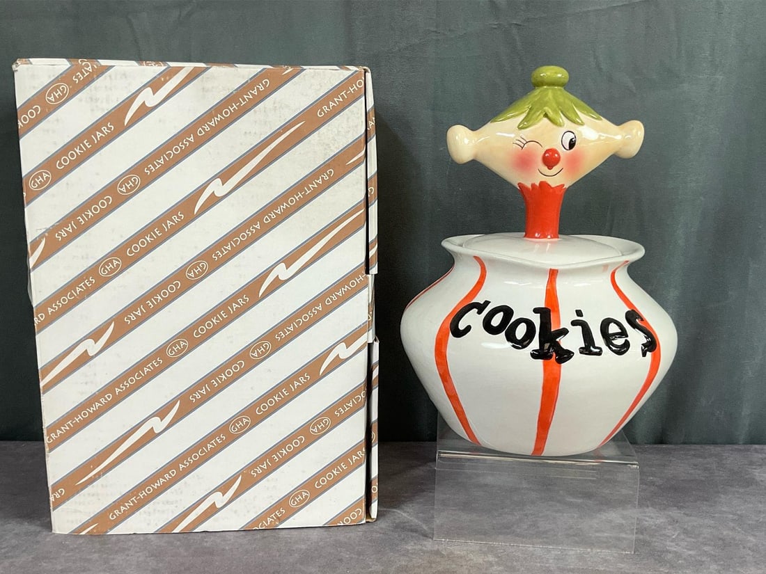 Grant-Howard Pixie Elf Cookie Jar: Circa 1990s In Grandmas Footsteps pixie elf design cookie jar with original box. Designed after the ones made in the 1960s. Lid has a rubber seal. The jar is 12 inches tall x 8 inches wide. Good condi