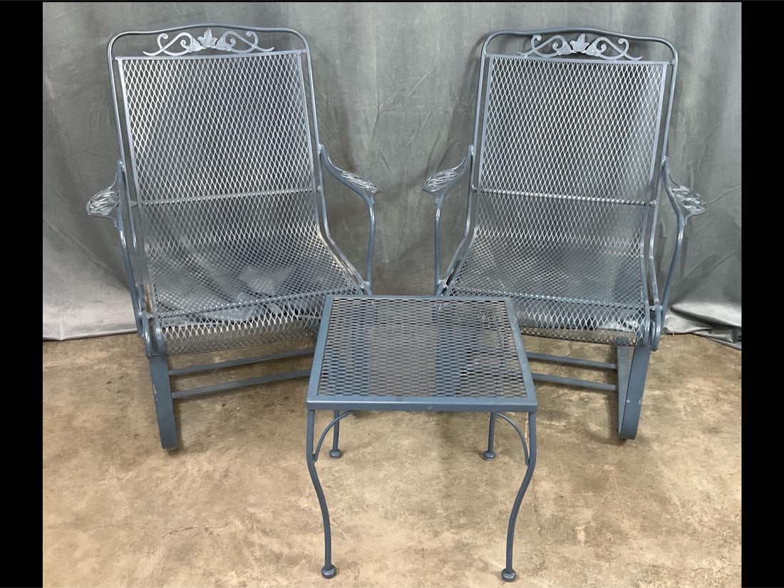 Pair of Wrought Iron Chairs & Center Table: Well made with curved seats. Good condition with a few small rust spots. Chairs are 36.5 inches tall.
