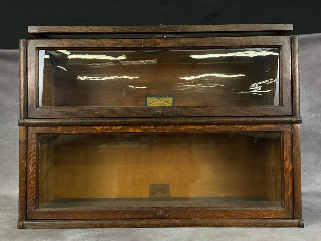Globe-Wernicke Bookcase Sections: Two stacking sections from a Standard D-10 1/4 Unit, Pattern 110, along with an extra glass front door for other section. Few scuffmarks and scratches but overall good condition. Assembled dimensions 