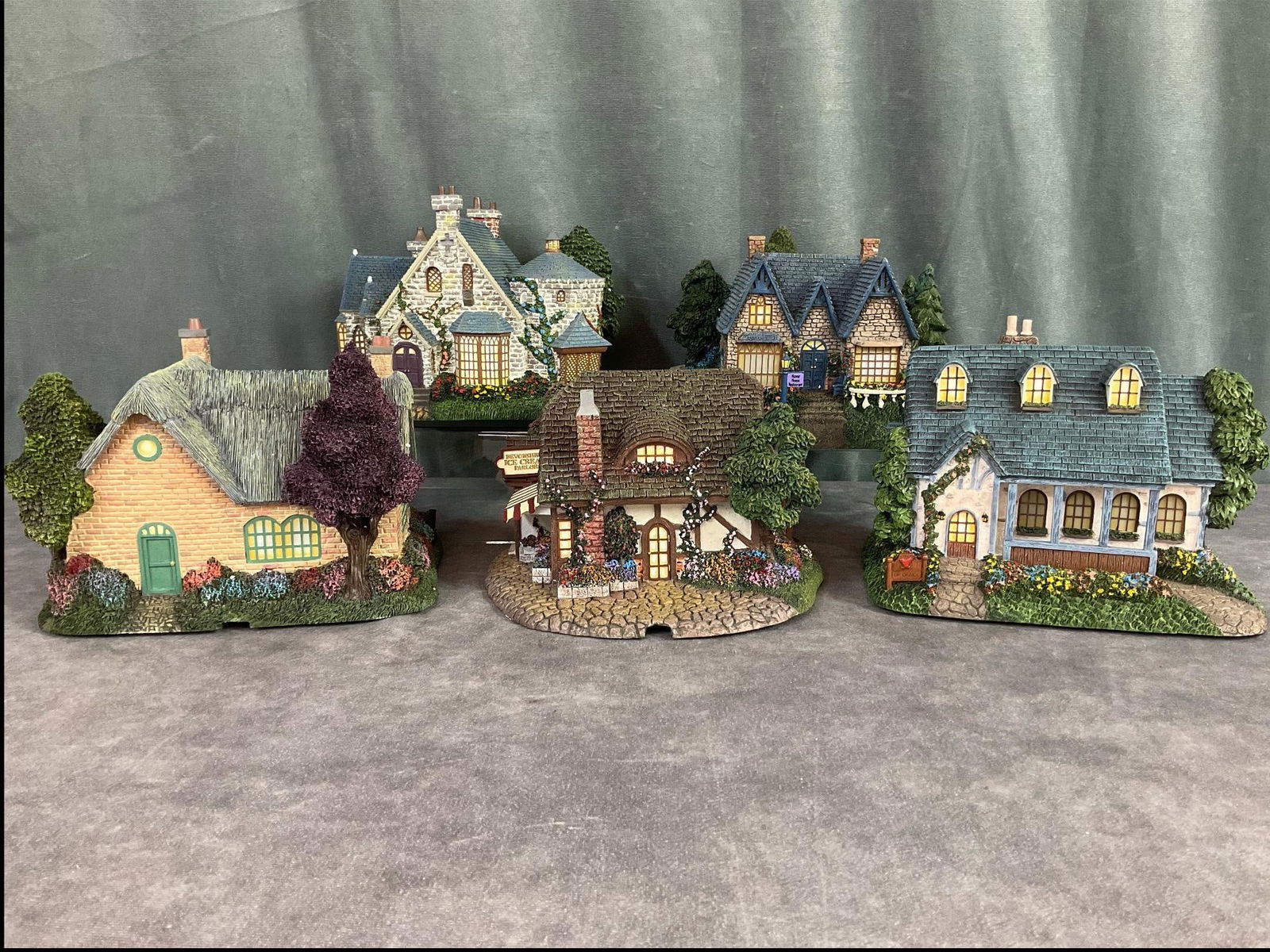 Hawthorne Village Thomas Kinkade Series: Five lighted buildings from the series. All come with original styrofoam boxes, cords, COAs. Good condition. Lamplight Manor cord does not work.