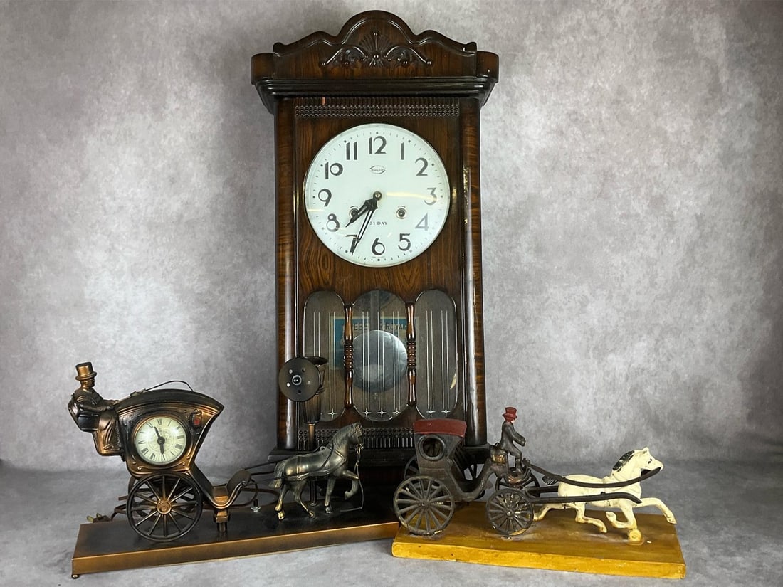 Carriage Clock & More: 1970s Sam Sung 31 Day clock made in Korea, 27.5 inches tall x 14 inches wide, no key. Winds and chimes but not guaranteed to run, chip to plastic trim on front. Mid century metal carriage clock with l