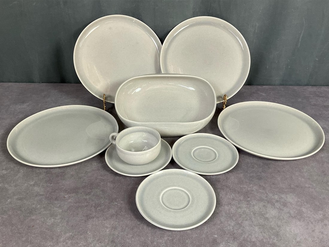 Russel Wright Dinnerware: Four 10 inch dinner plates, one serving bowl, three saucers, and one mug. All marked Russel Wright Steubenville on bottom. Good condition.