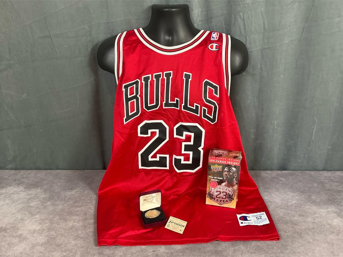 Michael Jordan Jersey & More: 1999 Champion Chicago Bulls Jordan jersey with tags and receipt of purchase, size XXL. 2009 Upper Deck limited edition 100 card pack, 6.5 inches tall x 3.5 inches wide x 2.75 inches deep, sealed pack.