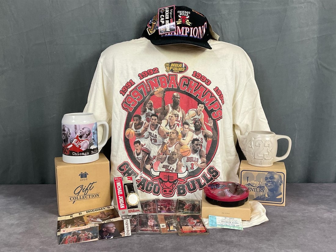 Michael Jordan Apparel & More: 1997 NBA Champs Starter t-shirt made in USA, size Large, yellowing to shirt. 1997 Locker Room cap, made in Taiwan, good condition with original tags. Avon 1997 Tankard, box is 5.75 inches tall x 5.75 