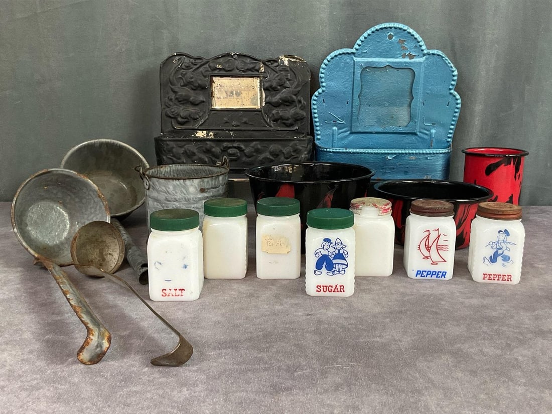 Enamel Kitchenware & Milk Glass Shakers: Three pieces red and black swirl enamelware, some chips and signs of wear. Three pieces of graniteware, rust present on all. Seven milk glass shakers, four marked made in USA, paint loss and one metal