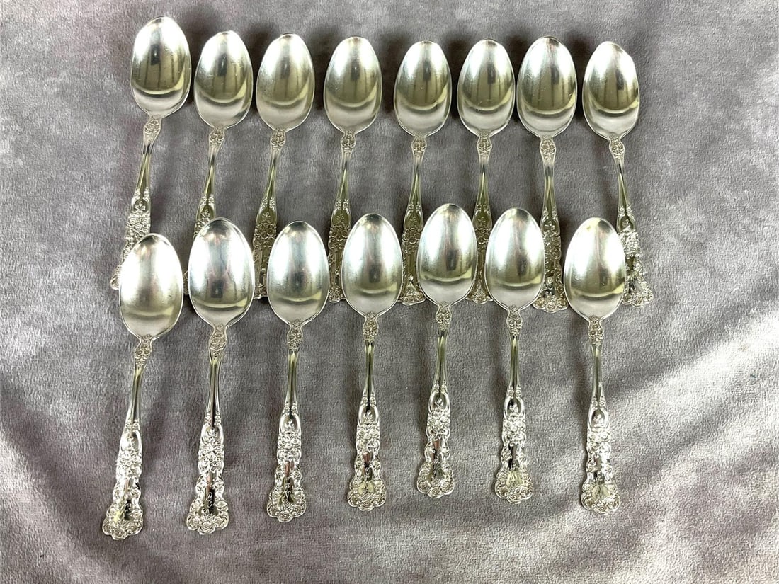 Gorham Sterling Buttercup Teaspoons: Group of fifteen. Marked sterling. Measures 5.5 inches long. Light scratches and tarnishing. Monogrammed. 10.08 ozt silver.