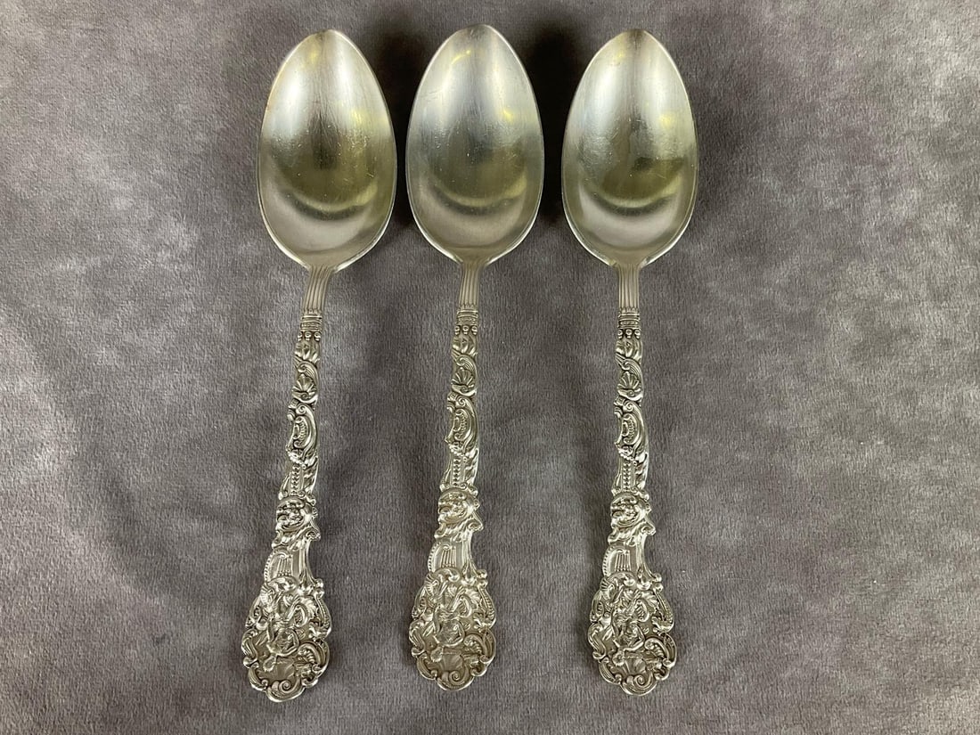 Gorham Versailles Sterling Serving Spoons: Group of three. Marked sterling. Measures 8 1/2 inches long. Light scratches and tarnishing. Monogrammed on back of handle. 7.38 ozt in silver.