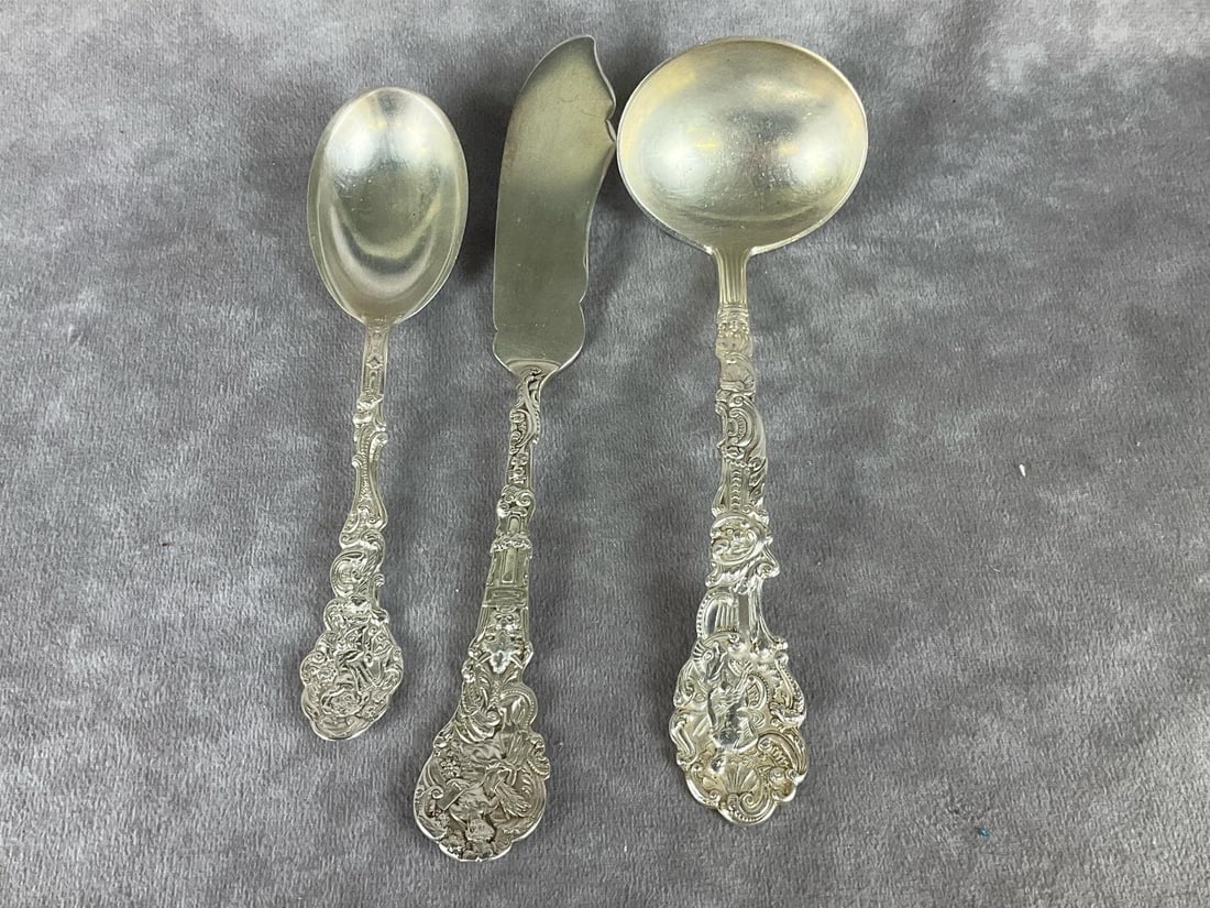 Gorham Versailles Sterling Variety: Three pieces. Sterling marked ladle measures 6 and 3/4 inches. Flat handle master butter knife is 7 1/2 inches. Jelly server is 6 1/2 inches. Light scratches and tarnish. Knife and jelly server have a