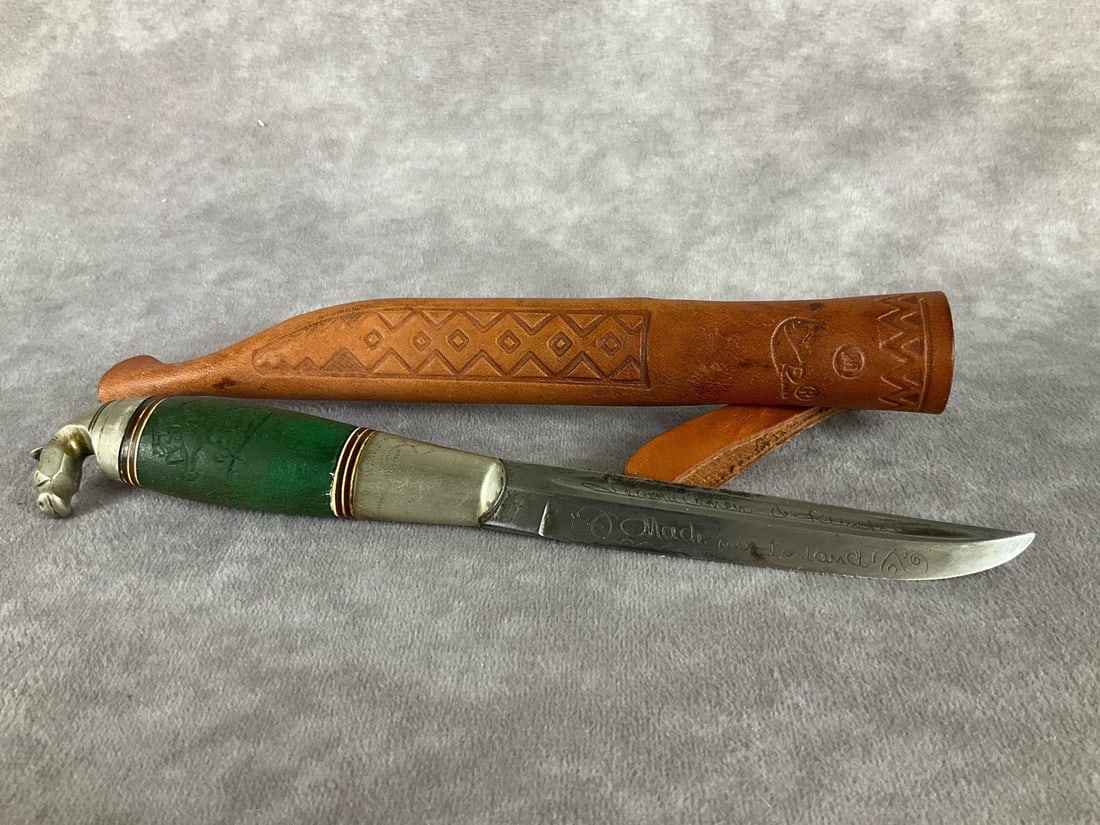 Finland Knife: Made in Finland, sheath is incorrect, but fits knife. Blade has been sharpened and has heavy wear. Measures 7.5 inches.