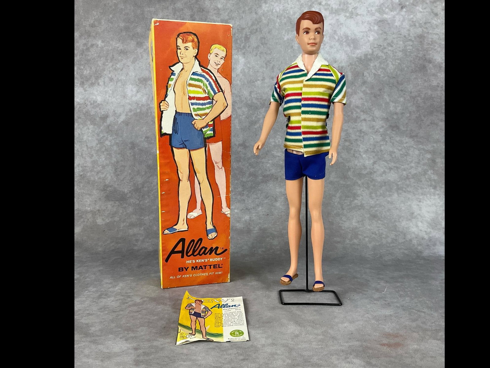 Mattel Allan Doll: Japan made in 1963. Original box with shelfwear and creasing. Doll is wearing original clothes made by Mattel. Advertising paperwork included. Measures 12 inches. Good condition.