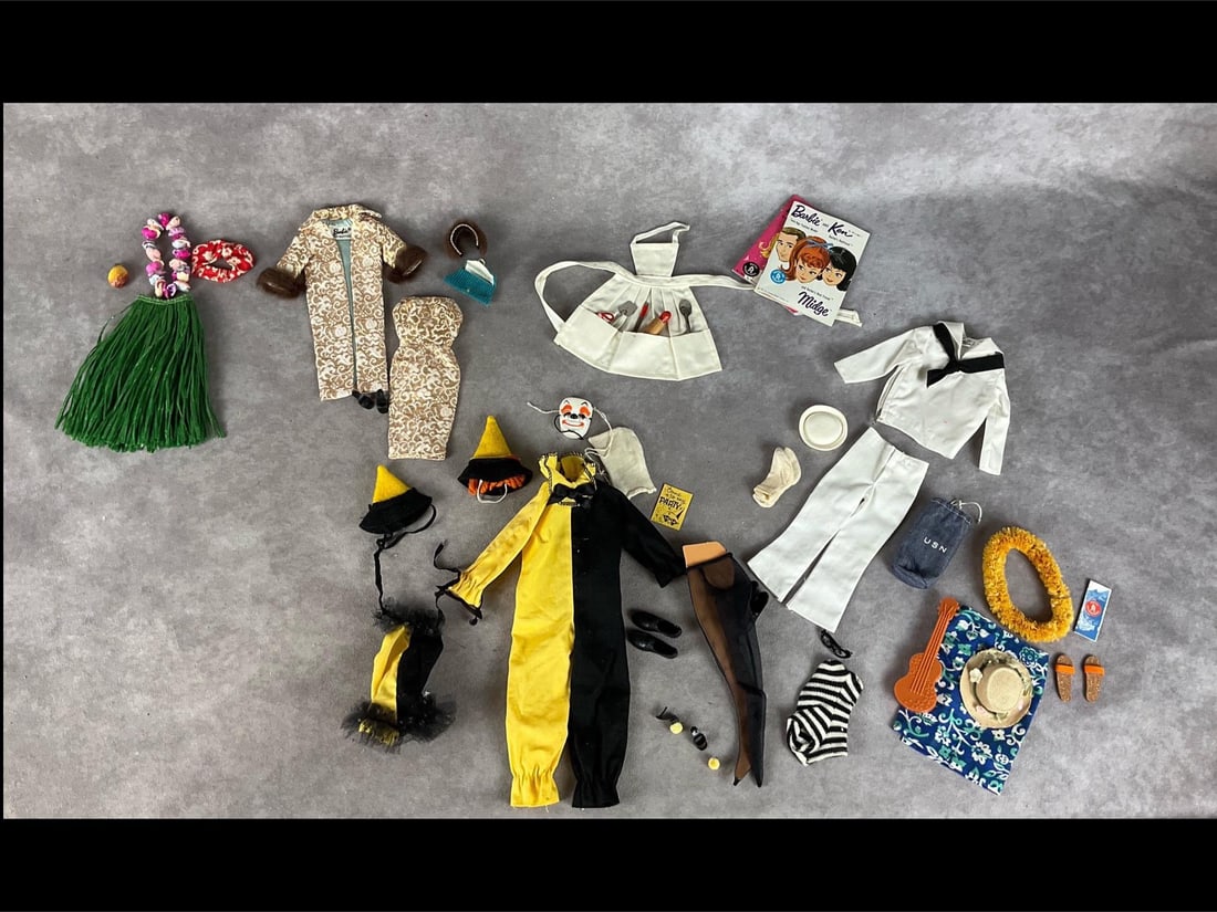 Barbie & Ken 1960s Fashion: All have been played with but are in good condition. Includes Ken and Barbie matching Masquerade (one of the Pom Poms on Barbie's shoe is detached), Ken and Barbie Go To Hawaii, Barbie Evening Splendo