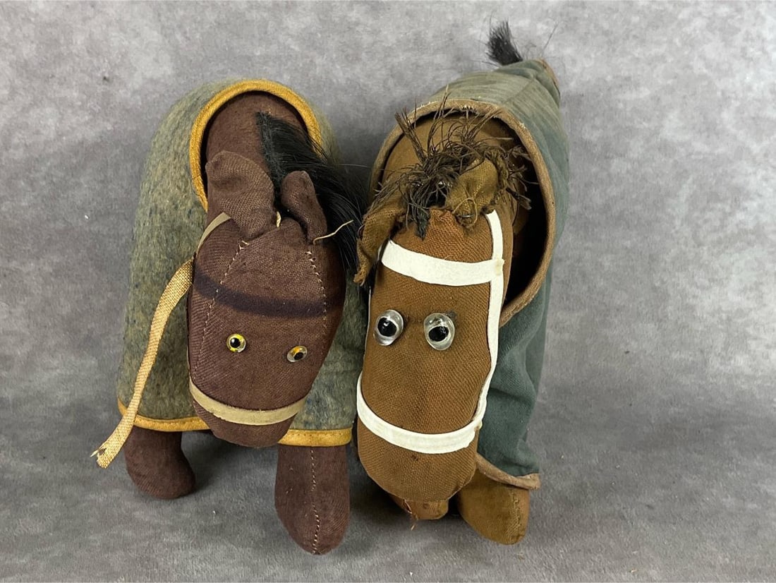 1920's Spark Plug Horse Toys: Character from Barney Google. Unknown if these were official releases or homemade. One horse has Spark Plug printed on its blanket, the other horses blanket does not have markings. Darker brown horse 