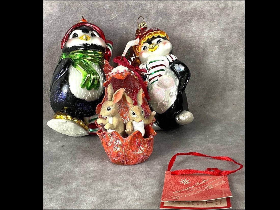 Christopher Radko Ornaments: Two penguins and a rabbit. All are in good condition. Includes Snow Mo Promo penguin, Woodland Winds rabbits, and Peppermint Penny Penguin. Rabbits and smaller penguin have boxes. Rabbits are the only