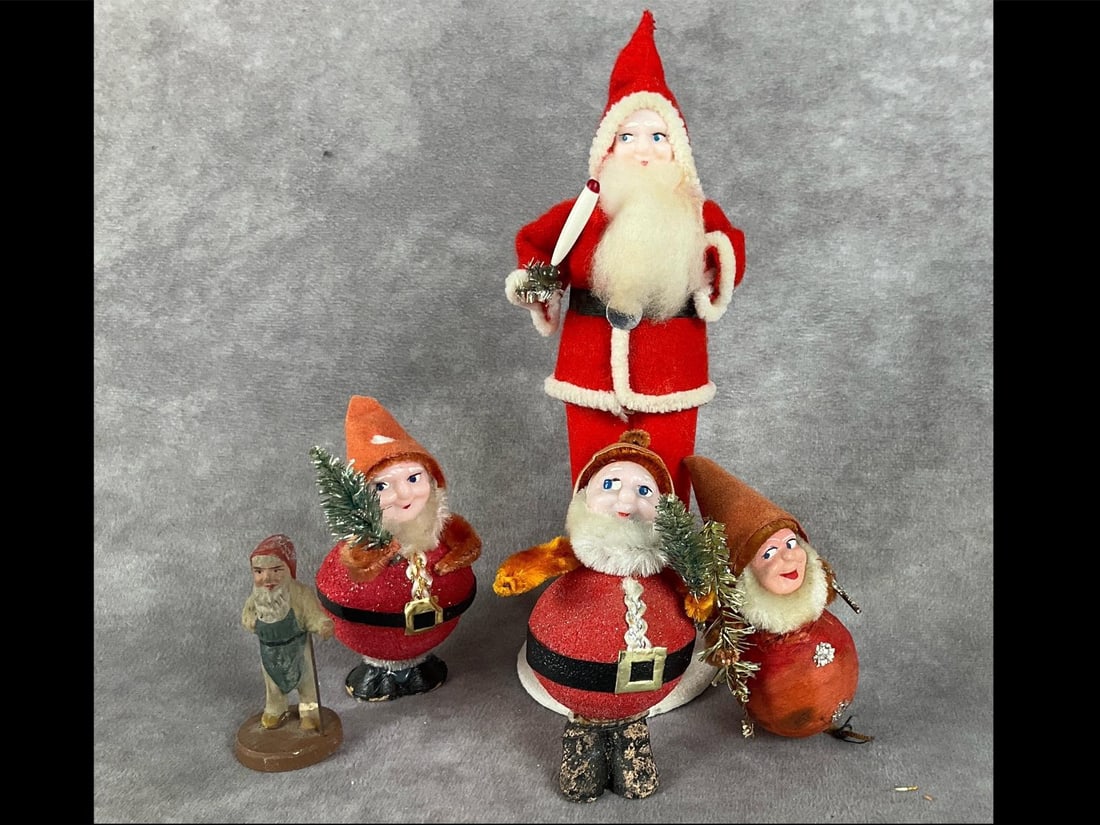 1940s Christmas Elves: Group of five. All are in fair to good condition, with two having damage. One elf is missing his base and another's leg is detached. Two are marked Japan. Tallest is 7 inches.