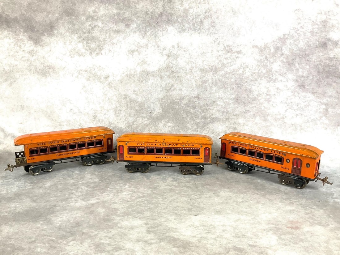 Ives Three Car Saratoga Set: 1930s. Three car set. Saratoga, Observation, and Buffet. Each car should illuminate, but has not been tested. All cars have paint loss, scratches and rust. Each car measures 10 inches wide x 3 x 3 inc