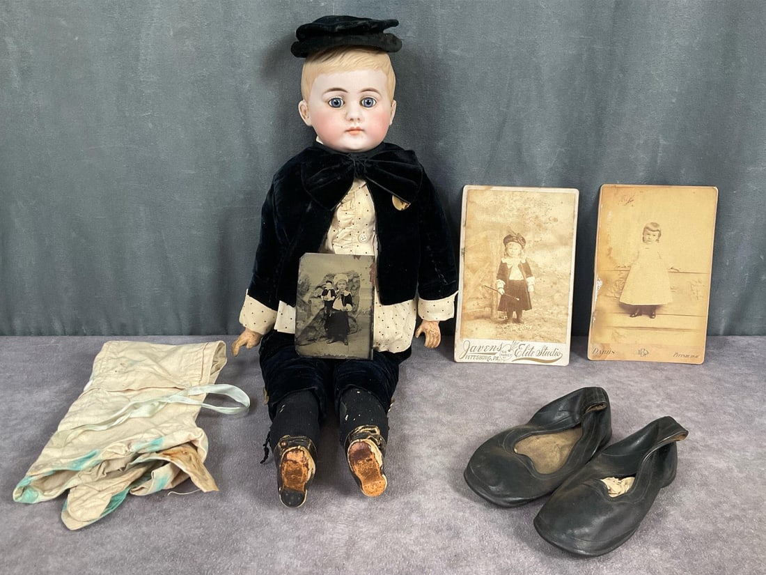 Important Goebel School Boy Doll: Circa 1890. Two cabinet cards and a tintype of the boy who owned this doll are included. Both cabinet cards are from Pittsburgh studios and one is dated 1892. The tintype is a rare find as it shows th