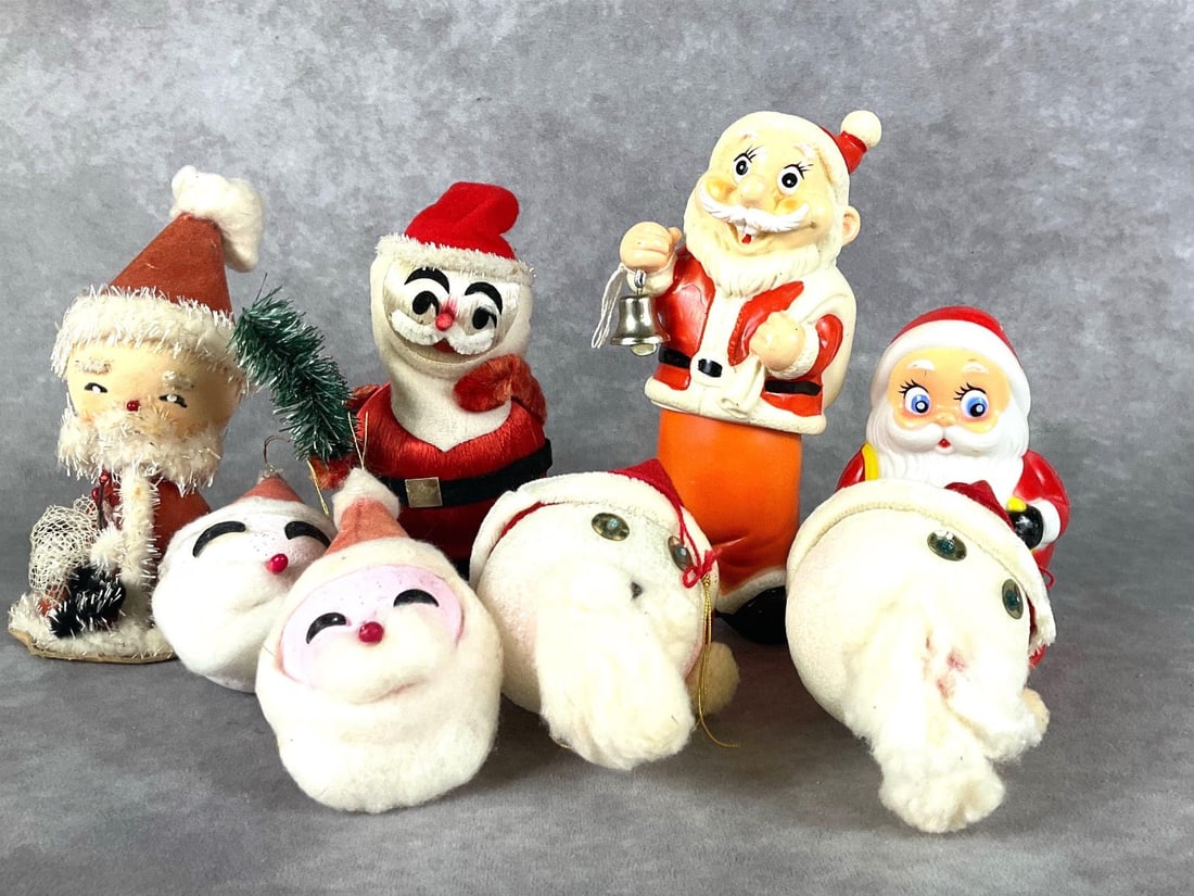 Japan Made Santas and More: Group of eight. Four are marked Japan, one is American made. Two are handmade. All are in good condition with some paint loss, fading and wear. Wind up Santa does not work. Tallest measures 7 inches.
